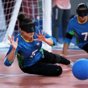 Two women playing Goalball
